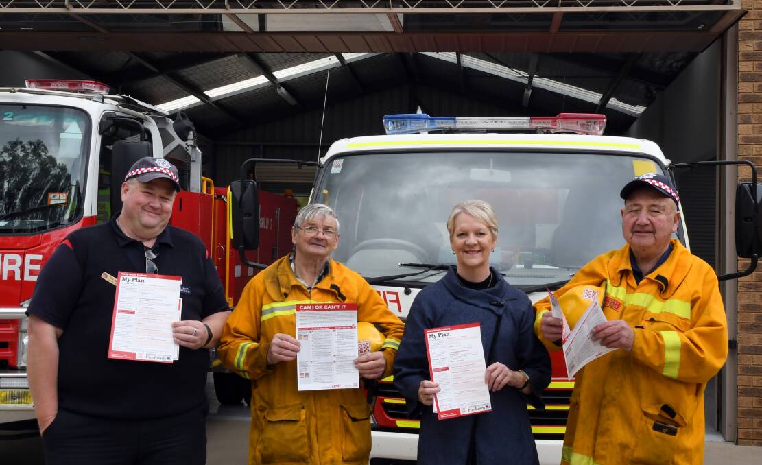 Maiden Gully firefighters Stan Dole and Brian Perry with CFA community education co-ordinator Paul Tangey (far left) and State Member for Bendigo West Maree Edwards.