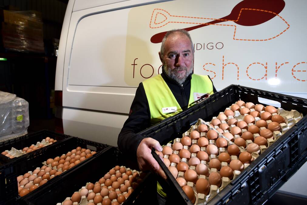 DELICIOUS TREAT: Ray Butler with a large part of what makes a cronut - eggs. Sonia Anthony of Masons of Bendigo will make the 550 cronuts from scratch.  Picture: JODIE WIEGARD