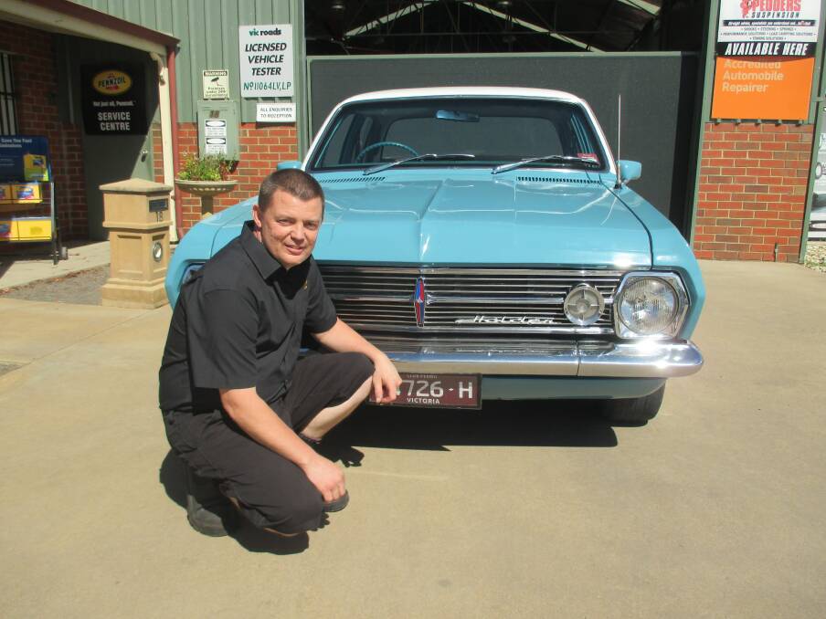 DISPLAY: Troy Cutting with his 1966 HR Holden. A classic vehicle "show and shine" will be held at the swap meet on Sunday. Picture: SUPPLIED
