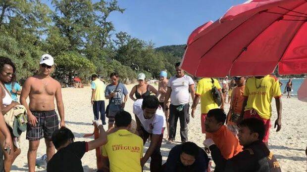 Lifesavers try to save the life of Victorian tourist Emily Jayne Collie on Phuket's Karen Beach. Photo: Facebook