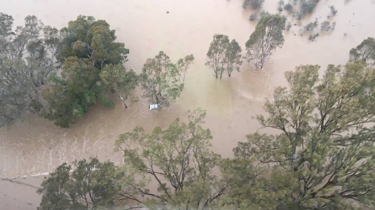 The car from the air, after the pair were rescued. Picture: HEMS 3