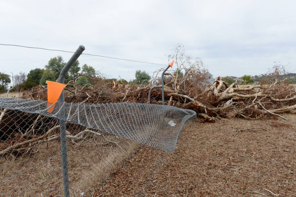 Some of the damage to the VicRoads wildlife fence that borders Jason Shaw's property. VicRoads said the fence was fixed the day before these photos were taken. Picture: DARREN HOWE