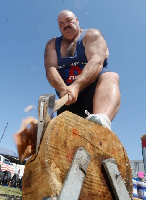CHAMP: Wood chopping champ David Foster. Picture: DARREN HOWE