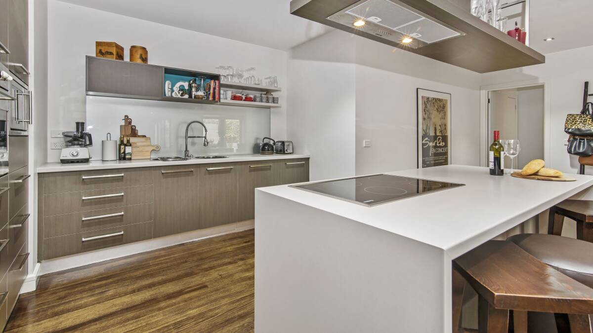 HEART OF THE HOME: While it can be difficult to know what can increase the value of the property, a contemporary kitchen is a smart start. Replace old appliances or fittings and treat the walls to a coat of paint.
 
 
