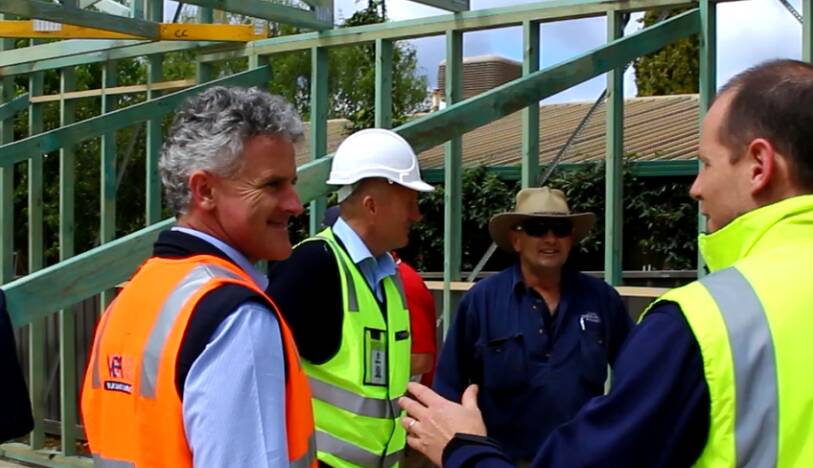 TICK OF APPROVAL: VBA's Leo Driden, WorkSafe's Peter Sullivan, Bendigo builder Gary Threlfall and EPA's Mark Vaughan during the recent Build Beware program in Bendigo, the leading regional centre chosen as the first destination for the rollout.


