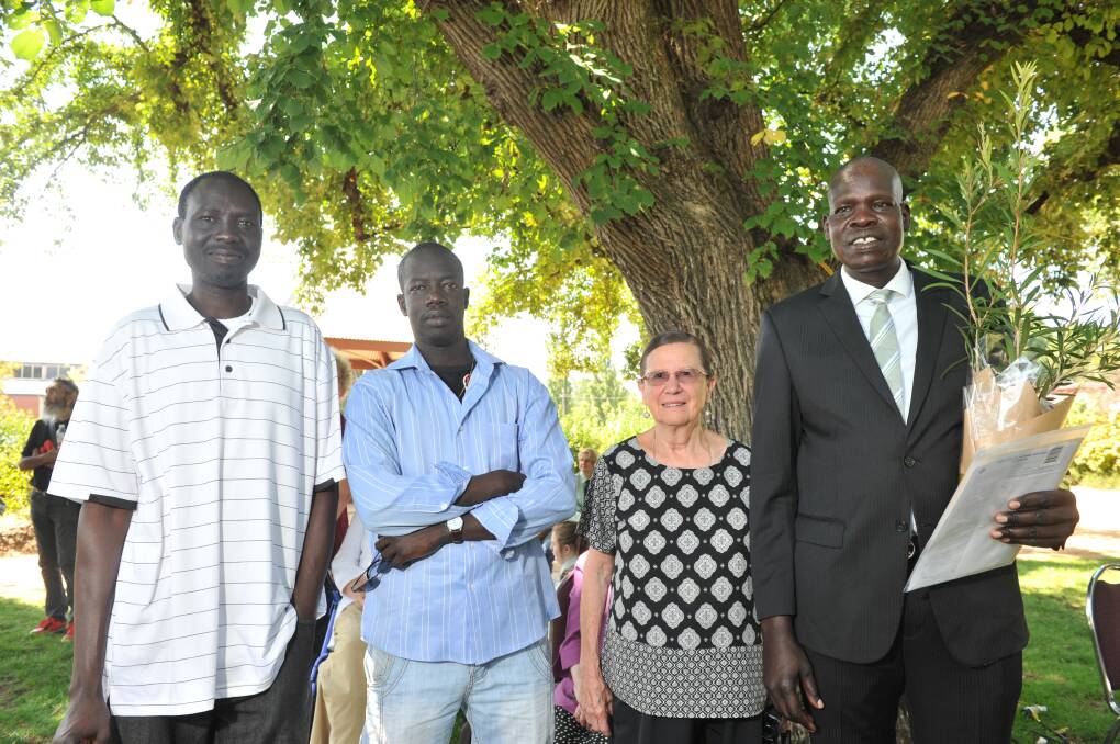 Flashback: Australia Day at Castlemaine. Yai Yai President of the South Sudanese Castlemaine Community Group, Rach Mawien, Eva Haarbuger and Rowal Achoe. Picture NONI HYETT 26.01.2016