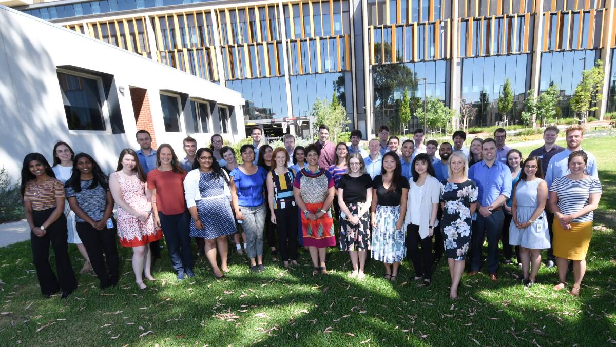 READY FOR PATIENTS: Bendigo Health chief medical officer Dr Humsha Naidoo with all of the new junior doctors. Picture: NONI HYETT 