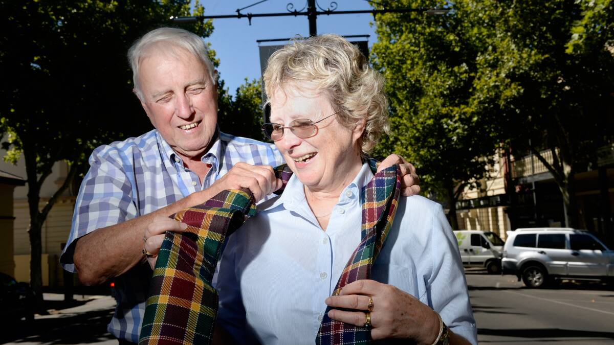 SCOTTISH PRIDE: 2017 Scots Day Out chieftain Neil Clark Presents Mrs Macpherson Noble with a scarf bearing the official Bendigo tartan. Picture: DARREN HOWE