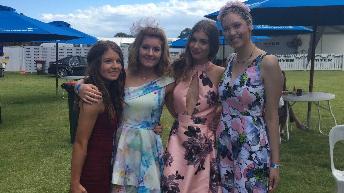 Spectators like Bethany (far right) travelling from Melbourne for today's races. 
Photo: Mark Kearney