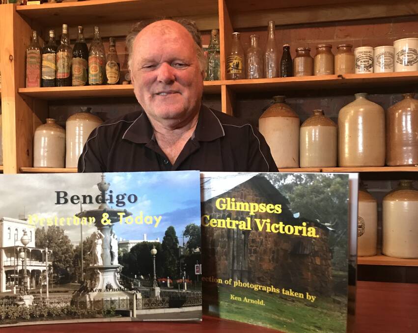 IMAGERY: Ken Arnold with two of the books he has edited this year. Ken has been producing books for 50 years. Picture: CHRIS PEDLER