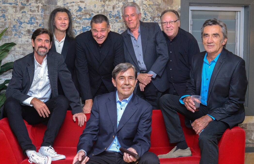 FULL BAND: John Paul Young with the musicians who will accompany him in Bendigo. Picture: SUPPLIED