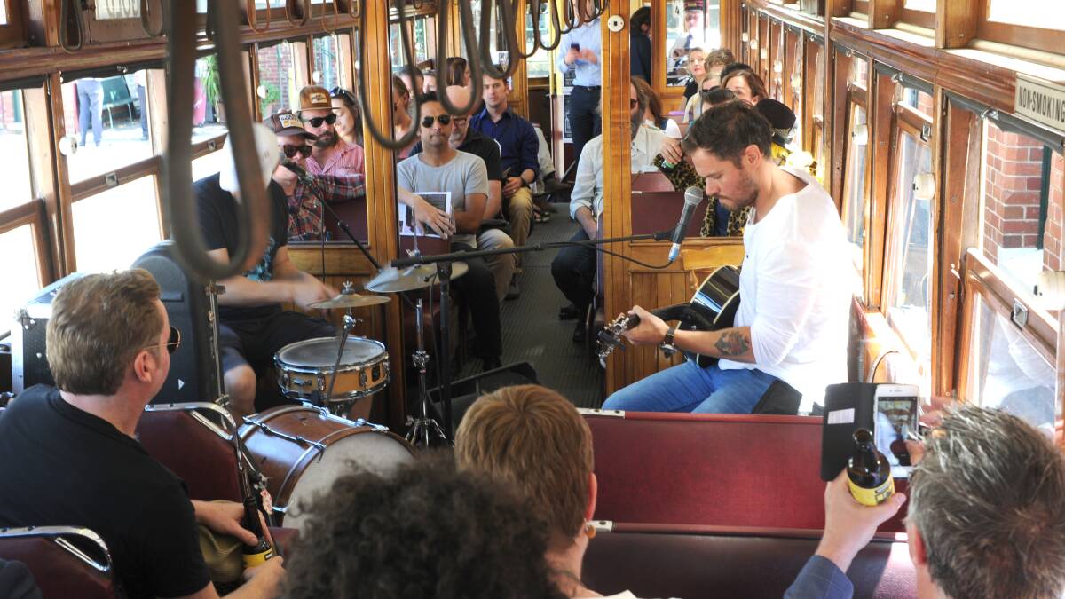 Benny Walkers plays on the Bendigo Blues Tram on Friday afternoon.