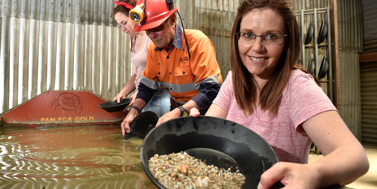 ACTIVITIES: Evonne Oxenham (front), Ian Johnson and Zoe Boyd pan for gold at the Central Deborah Gold Mine. Heritage Unwrapped is about thanking the community for supporting the city's heritage. Picture: NONI HYETT