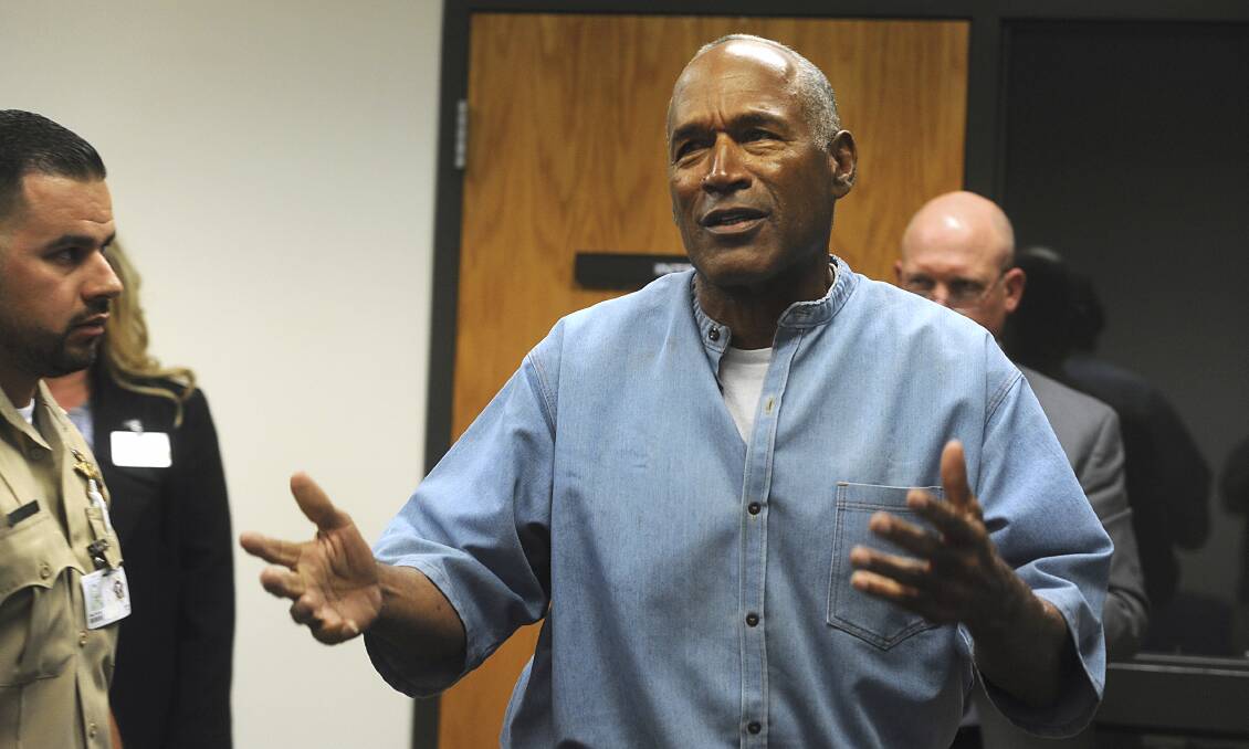 OJ Simpson reacts after learning he was granted parole at the Lovelock Correctional Center in Nevada. Photo: AP
