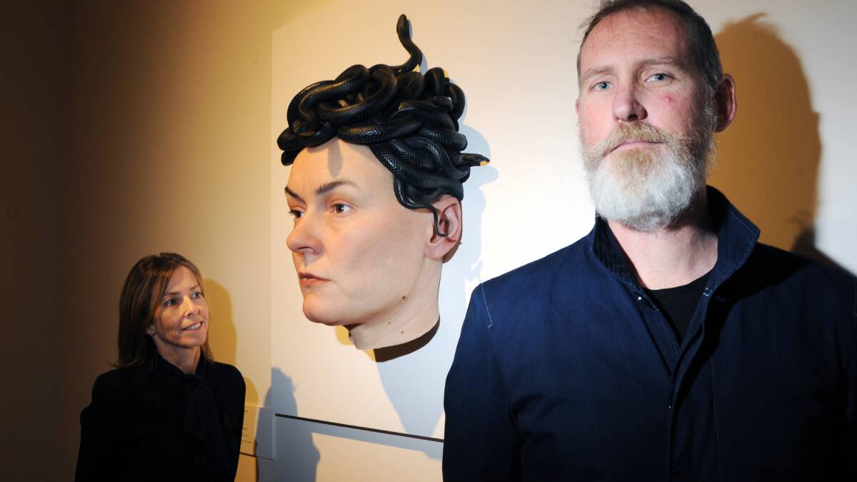 EXHIBITION: Karen Quinlan and Kent Wilson with a silicone artwork by Sam Jinks.