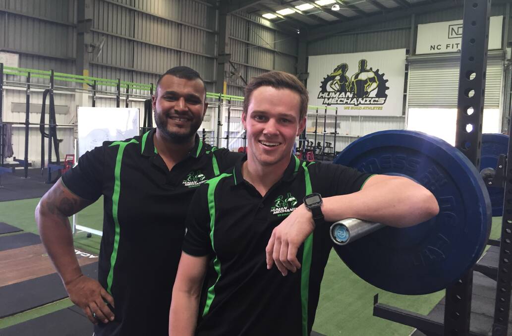 BOUND FOR THE US: Human Mechanics chief executive Arj Perera and personal trainer Todd Jarratt. Jarratt is hoping to head to Stanford and follow a career path to elite sports coaching. 