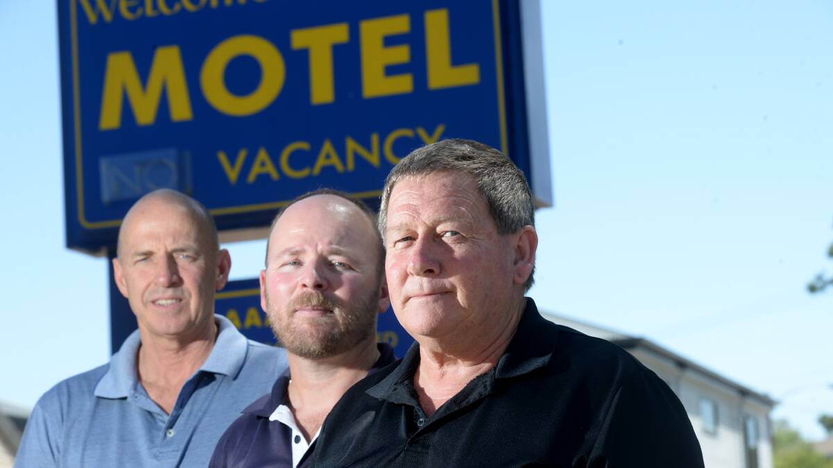 Motel owners Charlie Loftus with Simon Wurf and Brent Curran.