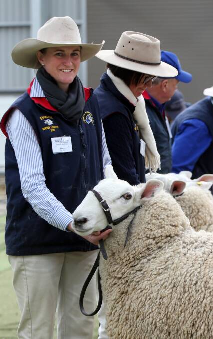 COMPETITION: Rowena Sweeney shows a sheep on Saturday. She was one of hundreds to face the judges. Pictures: Glenn Daniels