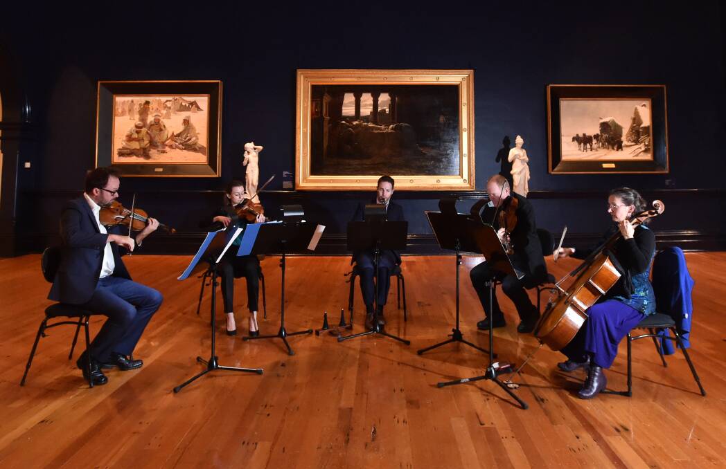 ATMOSPHERE: Orchestra Victoria's Melodious Mozart players performing at Bendigo Art Gallery on Tuesday.  Picture: JODIE WIEGARD