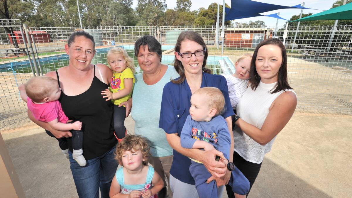 CAMPAIGN: Trish Wilkinson, Jacki Brown, Heather Woodman and Shannon Hill, pictured with kids Lorelai and Everlyn, Ruth and Harry, and Isabelle, are among those in the Colbinabbin community who have been fighting to save the town's pool. Picture: NONI HYETT