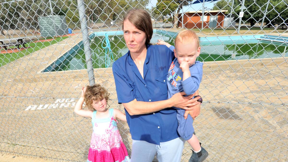 CONCERNED: Colbinabbin resident Heather Woodman, with children Ruth and Harry, has been worried by the suggestion of closing the town's pool. Picture: NONI HYETT