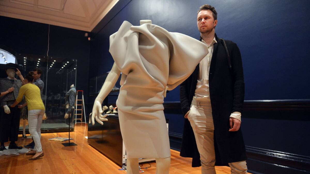 INNOVATIVE: Australian fashion designer Toni Maticevski, pictured with one of his creations in 2013. Picture: BRENDAN MCCARTHY