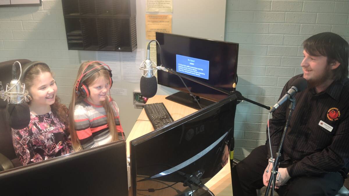 RADIO RASCALS: Phoenix FM's nine-year-old radio presenters Liarra Pule-Leech and Maddix Dixon interview station president Samual Harrison.