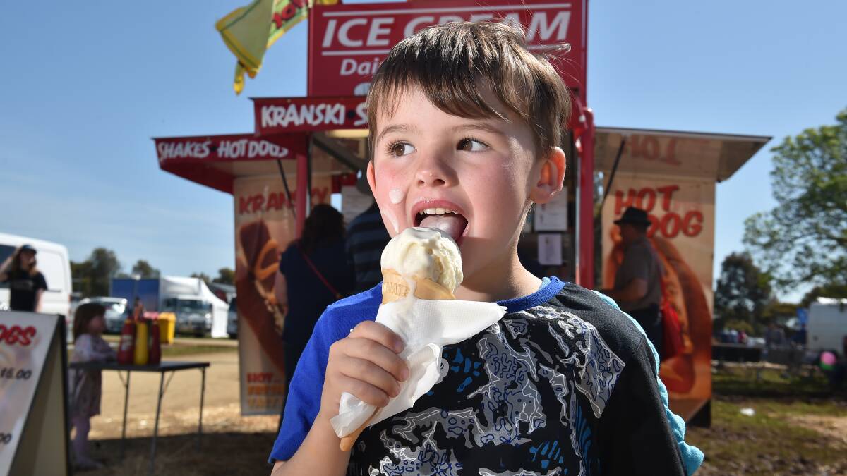 HAPPY: Kai McKenzie seeks sweet relief from the warm weather at Elmore Field Days. Picture: NONI HYETT