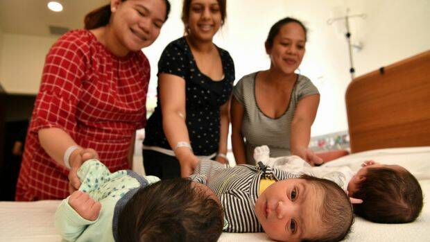 Baby Liam (left) with mum Awie Sajorda, a yet-to-be named baby (middle) with mum Gurpreet Paik, and baby Kloe (right) with mum Caroline Machete at Werribee Hospital. Photo: Joe Armao, Fairfax Media