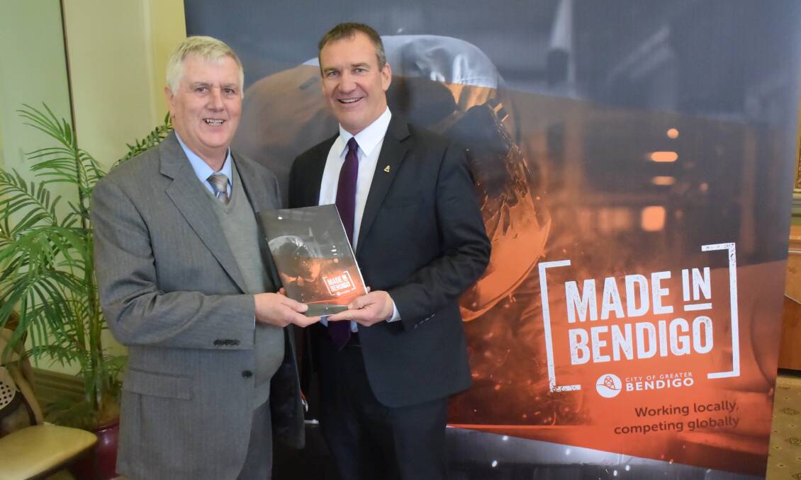 PROMOTE: City of Greater Bendigo economic development unit manager Brian Gould and chief executive officer Craig Niemann with the Made in Bendigo publication. 