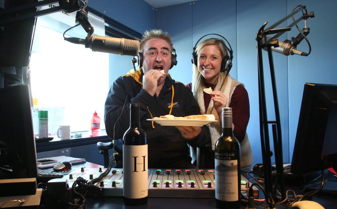 SAY CHEESE: 3BO breakfast hosts Bryan Coghlan and Erin Ryan, better known as Cogho and Ez, hope the community will join them in enjoying Australian cheese to support dairy farmers. Picture: GLENN DANIELS
