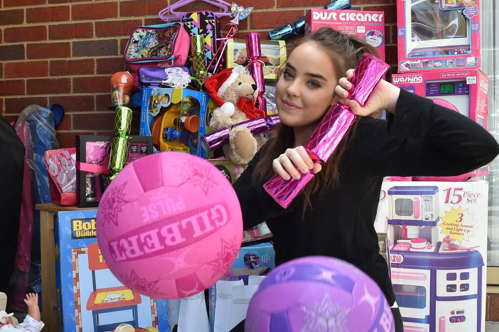 GENEROSITY: Helena Noonan-Barros with some of the toys she has collected for kids this Christmas. Picture: NONI HYETT