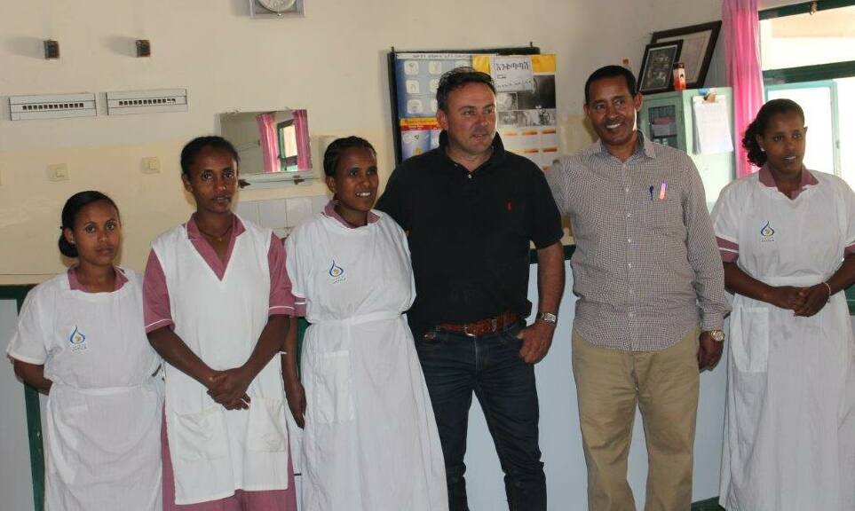 EXPERIENCE: Fortuna Villa owner Paul Banks with Dr Bitew Abebe and nursing staff at a Hamlin fistula hospital in northern Ethiopia.