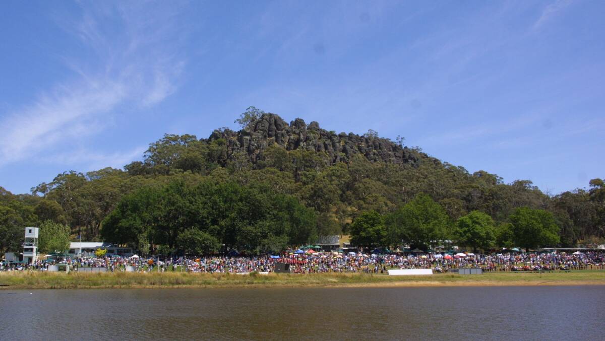 DISCUSSION: Racegoers in the shadow of Hanging Rock. Balancing the experience of visitors with environmental considerations is one of the challenges identified in a vision paper looking at the future of the precinct.