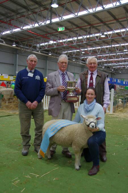 The weaner ewe that won the Dick Clayton Perpetual Trophy for Perendale breed, along with judge Malcolm McKelvie, Gavin Wall (president ASSBA) and stud principals, father and daughter, Malcolm Fletcher and Trudy Boyer, Mount Monmot, Skipton.