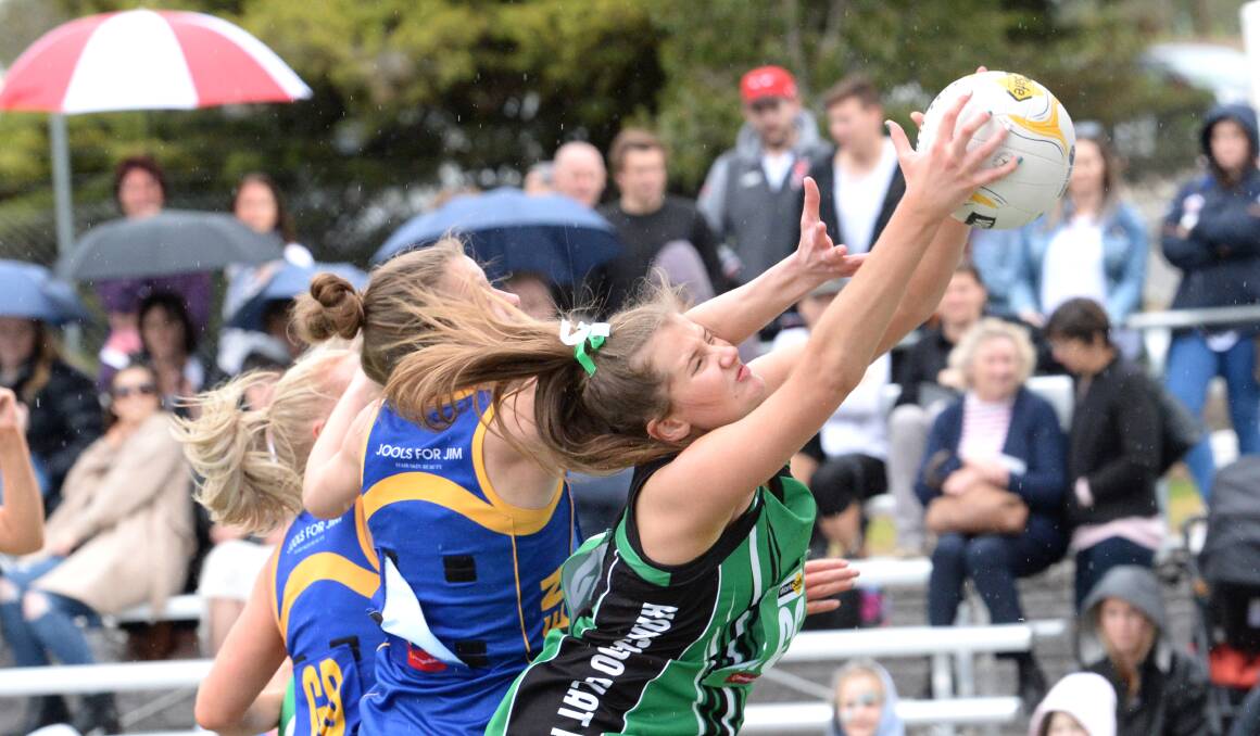 Ruby Barkmeyer gains possession despite intense pressure from Golden Square's Lucy Morcom and Meg Gilbert. Picture: DARREN HOWE