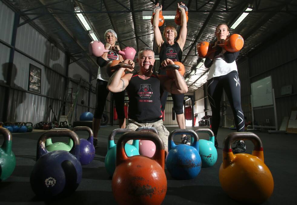 POWERING ON: Maxine Smith, Don Grant, Jen Fletcher and Melanie Harris are setting records in the sport of kettlebell lifting. Picture: GLENN DANIELS