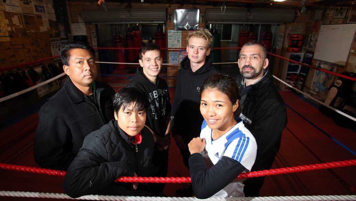 Brad Morgan and Matt Hall, with Thai promoter Narongwas Buamas, Lynden Hosking, from Hosking Promotions, and Thai fighters Saranyaphong Theinthong and Atitaya Saisin at the Connolly Boxing Gym in California Gully.  Picture: GLENN DANIELS