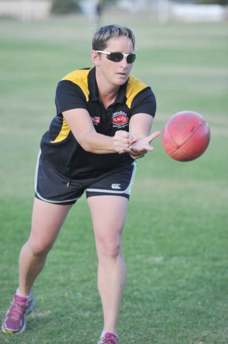 Cherie O'Neill leads the way during pre-season training. Picture: NONI HYETT