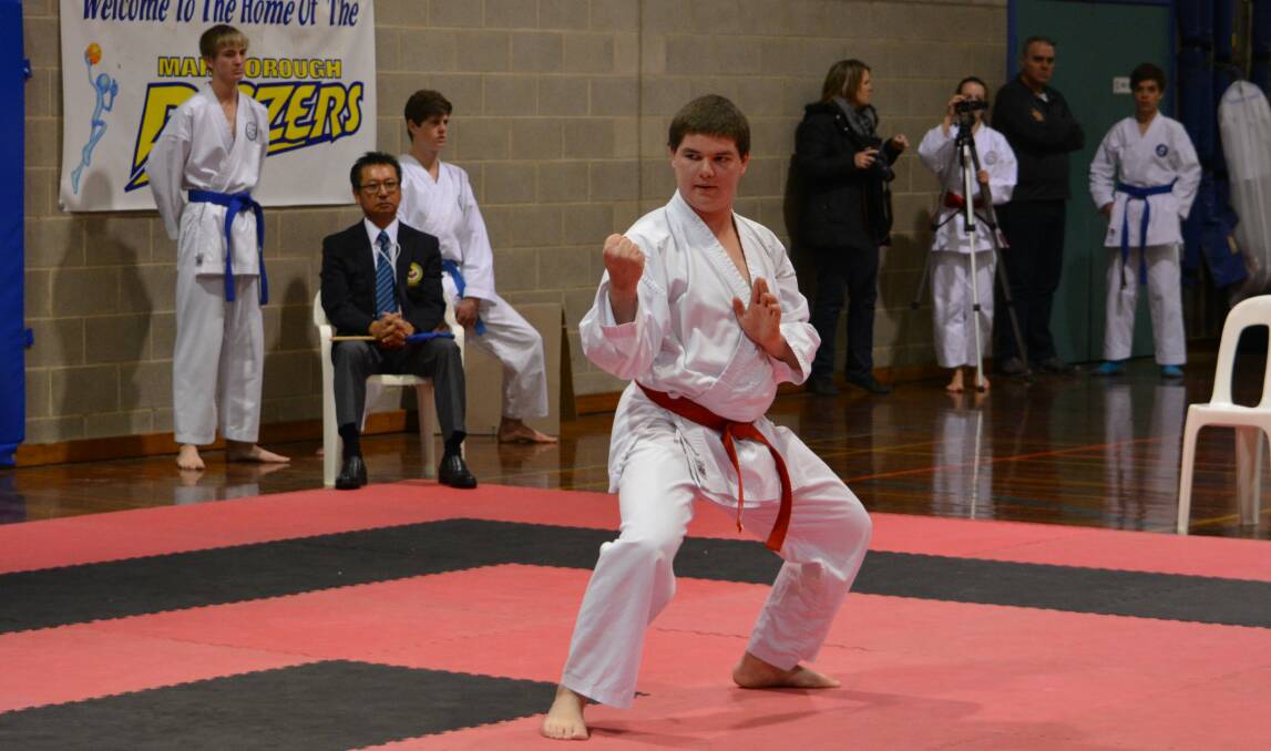 David Nicholas earned silver medals in individual and team kata.