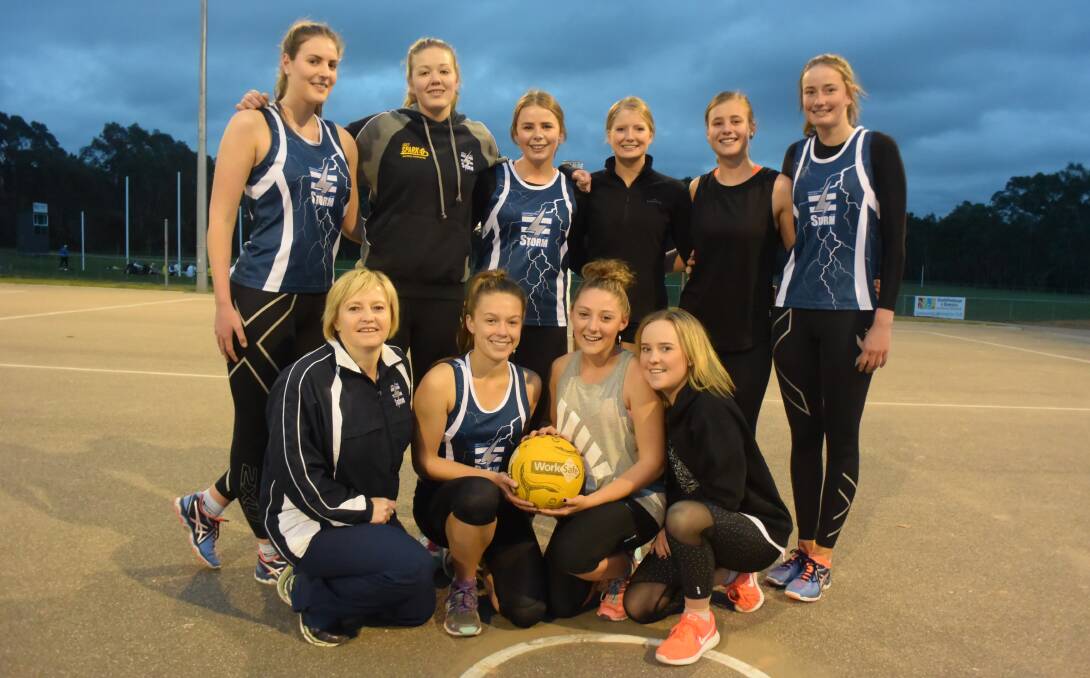 READY FOR BATTLE: Strathfieldsaye's 17-and-under grand final netballers gather for a photo with their coach Zenda McConnell. Picture: KIERAN ILES