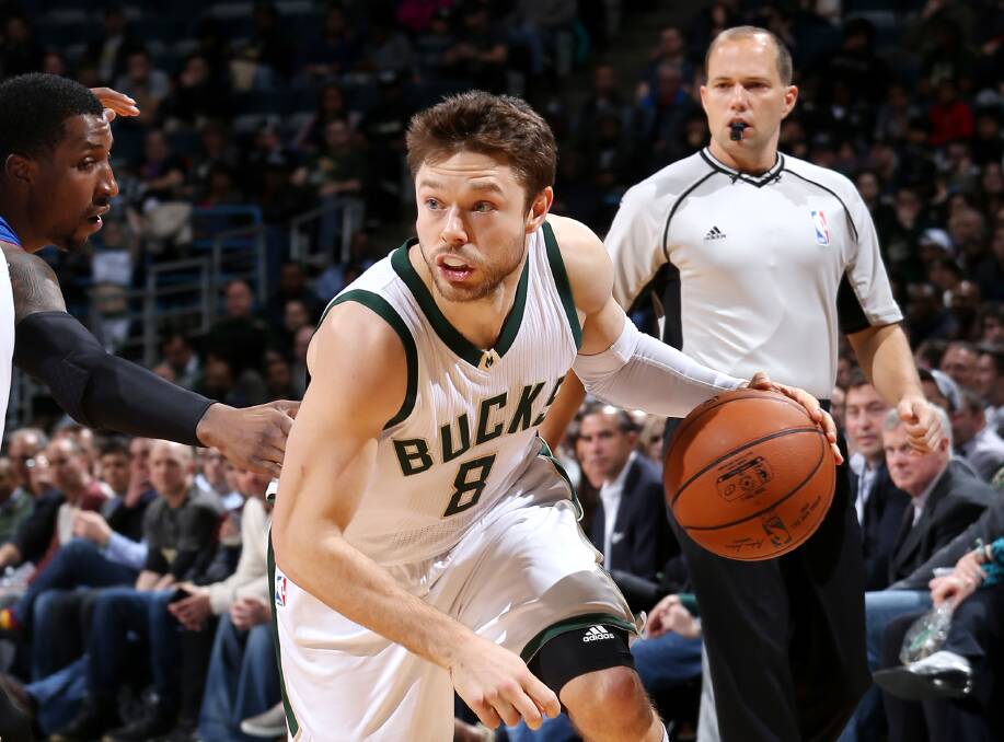 BUCKS WIN: Matthew Dellavedova, of the Milwaukee Bucks, drives to the basket during the game against the Detroit Pistons in Milwukee. Picture: GETTY IMAGES