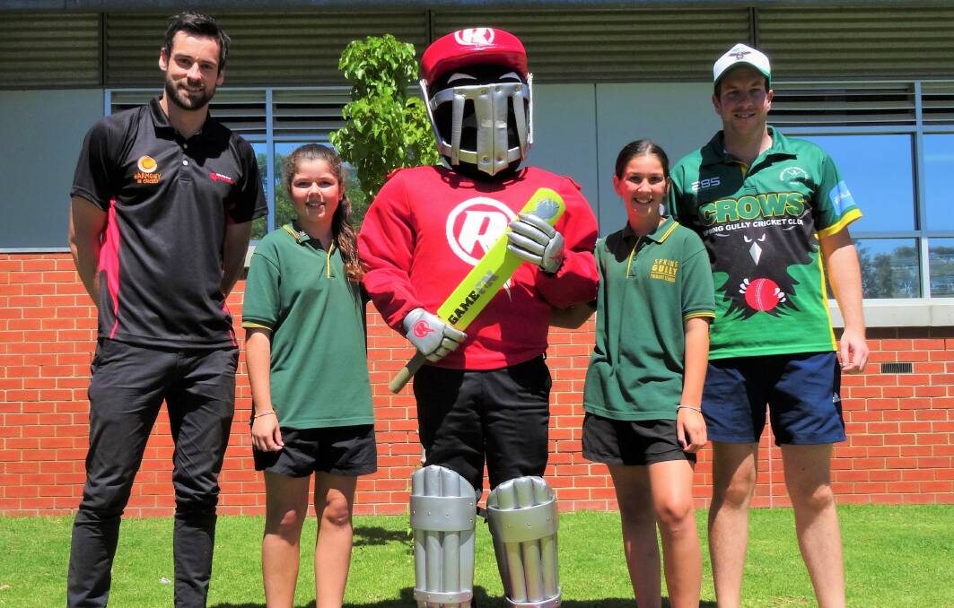Renegades cricket development officer Jacob DeAraugo Ellie Thompson, ‘Sledge’ (the Melbourne Renegades Mascot), Lila Wilson and Spring Gully Cricket Club's Alex Sutton.
