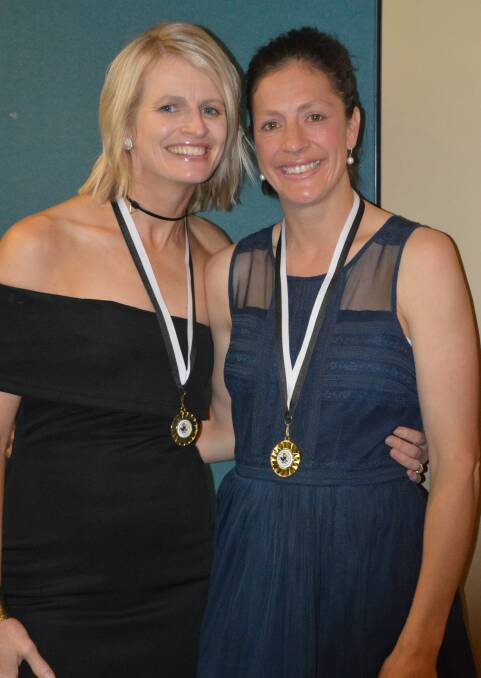 A-grade netball best and fairest Laura Clarkson (right) with runner-up Alicia Cassidy.