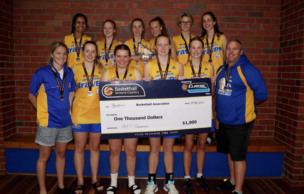 Bendigo Braves' under-16 girls championship winning team with coach Nick Salm and assistant coach Tahnee Cannan. Picture courtesy Basketball Victoria.