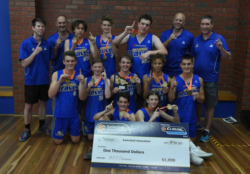 WINNING BRAVES: Back (from left): Aaron Fry (assistant coach), Paul Cole (team manager), Patrick Tarr, Zachary Frye, Jackson Fletcher, Ben McCauley (coach) Adam Tarr (assistant coach). Middle: Xavier Cole, Lachlan O’Brien, Harrison Welch, Dyson Daniels, William Beagley. Front: Macey Eaton and Dylan McCauley.