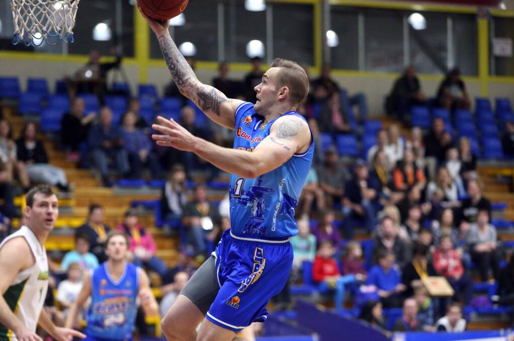 Gun American import Jeremy Kendle flies high for a basket during his stellar debut season for the east conference leading Bendigo Braves. Picture: GLENN DANIELS
