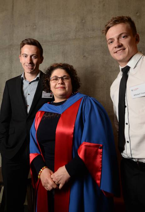 Engineering graduates Daniel Fedele and Mitchell Trounce with their lecturer Dr Daniela Ionescu. Picture: DARREN HOWE