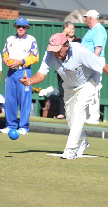 Don Middlebrook sends his bowl on its way down the green.