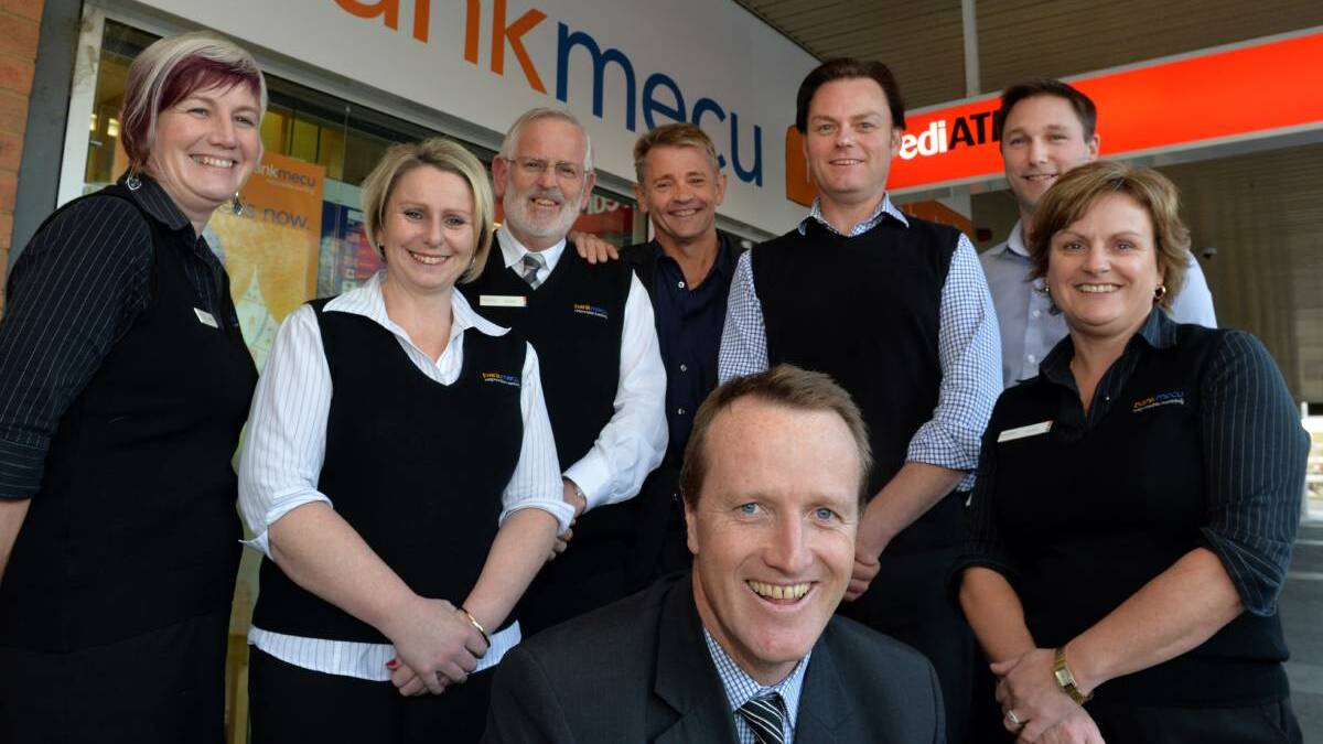 bankmecu staff in Bendigo are pictured in 2014 after they won a nation-wide award for having Australia's happiest bank customers.